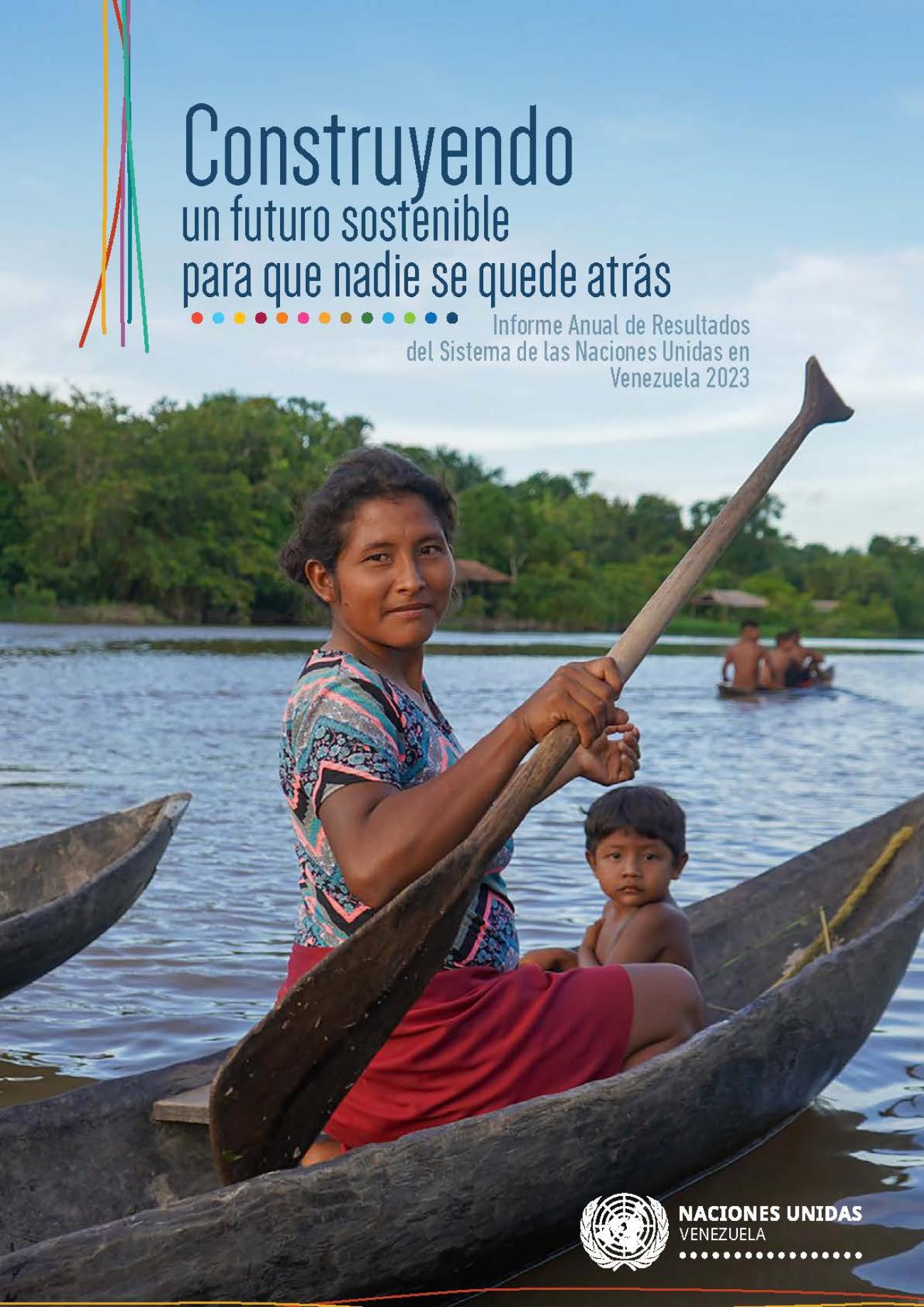 Portada del Informe Anual de Resultados Naciones Unidas Venezuela 2023 con el título del informe, el logo de ONU Venezuela y una fotografía de una mujer indígena y un niño en una canoa.